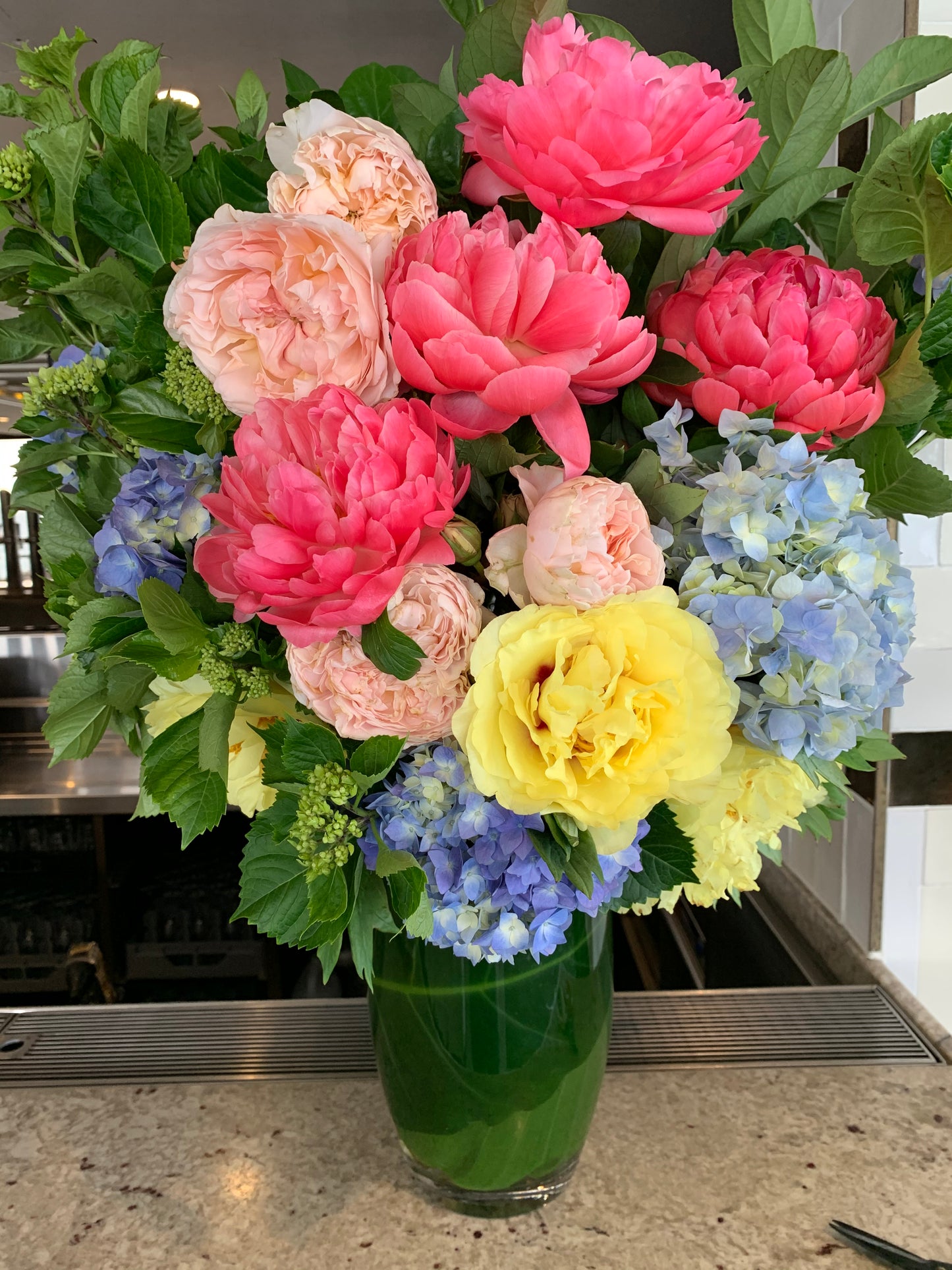 Corporate, front-of-house weekly arrangements.